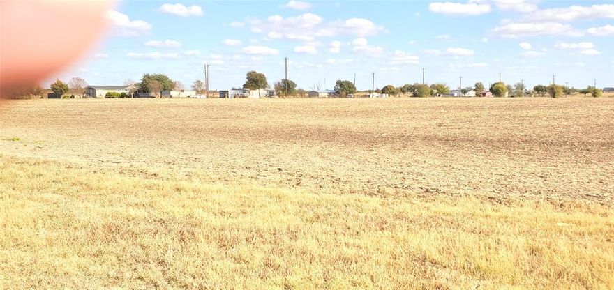 This property is open and in ideal condition for a single-family residence, agricultural and or business use. Although there is a settled community nearby there are also several recently built new homes in the nearby area.  It's outside the city limits with no known restrictions. Buyer should verify zoning and restrictions, if any, with Ellis County's Dept. of Development, as well as utilities and other pertinent information.  Public water is available nearby with the purchase of a meter.  Aerobic Septic will be needed since public sewer services are not nearby.  The adjacent 2-acre tract is also available for sale by the same owner.