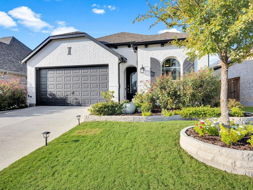 Welcome to Sandbrock Ranch, where this stunning Highland Homes build offers the perfect blend of elegance, craftsmanship, and comfort. From the moment you arrive, the brick façade, and lush landscaping, sets the tone for a home that has been thoughtfully designed for both everyday living and memorable gatherings. Step inside to discover 4 spacious bedrooms and 3 beautifully appointed baths, highlighted by soaring ceilings, abundant natural light, and signature Highland architectural details. The open-concept living area features a stunning fireplace, seamlessly flowing into the gourmet kitchen adorned with an island, plenty of cabinet space, and dreamy upgrades —the perfect space for cooking and entertaining. The primary suite is a serene retreat with bay windows, a spa-like bath, and large walk-in closet, offering the perfect escape at the end of the day. Step outside to the covered patio, with extended deck, then into your private backyard, where you can enjoy peaceful Texas evenings or host weekend get-togethers. Located in the heart of Aubrey, this home grants access to top-rated schools, community amenities like multiple pools, a splash pad, walking trails, a fitness center, dog park, and clubhouse, and the small-town charm that makes this area so desirable. With timeless quality and modern luxury, this Highland Home is more than a house—it’s the lifestyle you’ve been waiting for. All that’s left is to add your personal touch.