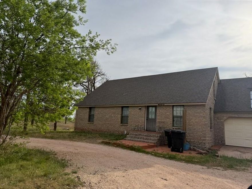 This one is a true go-getter-don't wait! Priced well below tax appraisal and sold STRICTLY as-is, the property is packed with potential. Featuring a 4 bedrooms, 3 bathrooms, and a 3-car garage, plus a seperate 1-bedroom apartment with its own private entrance-ideal for rental income, guests, or multigenerational living. Situated on 1 acre,with additional land available separetely if desired. Conviently located just 1 mile from the AI DATA CENTER. Bring your investment vision and make it your own!