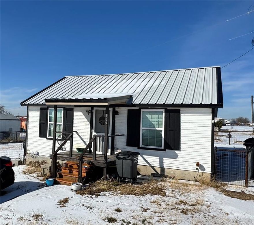 Step inside this adorable 2 bedroom 1 bath to discover this well designed layout that blends cozy living spaces with farmhouse character .Both bedrooms are well sized and share a nicely updated full bathroom.  The living area flows easily into the adjacent kitchen and dining space perfect for everyday living or entertaining guests. The farmhouse interior includes wainscotting and decorative lighting, enhancing comfort and appeal. Pipe fencing around the back of the property perfect for pets or added privacy and a new patio with an awning for entertaining or having family gatherings. A new metal roof was installed in 2025, which added to the farmhouse charm this house already displays. This would be ideal for first time home buyers, newlyweds, or young families  that would love to be close to local schools and shopping. Washer and dryer will convey with the property. Buyer and buyers agent to verify all information, including but not limited to square footage, schools, taxes, room measurements, and restrictions. Information deemed reliable but not guaranteed. Listing agent is related to seller.