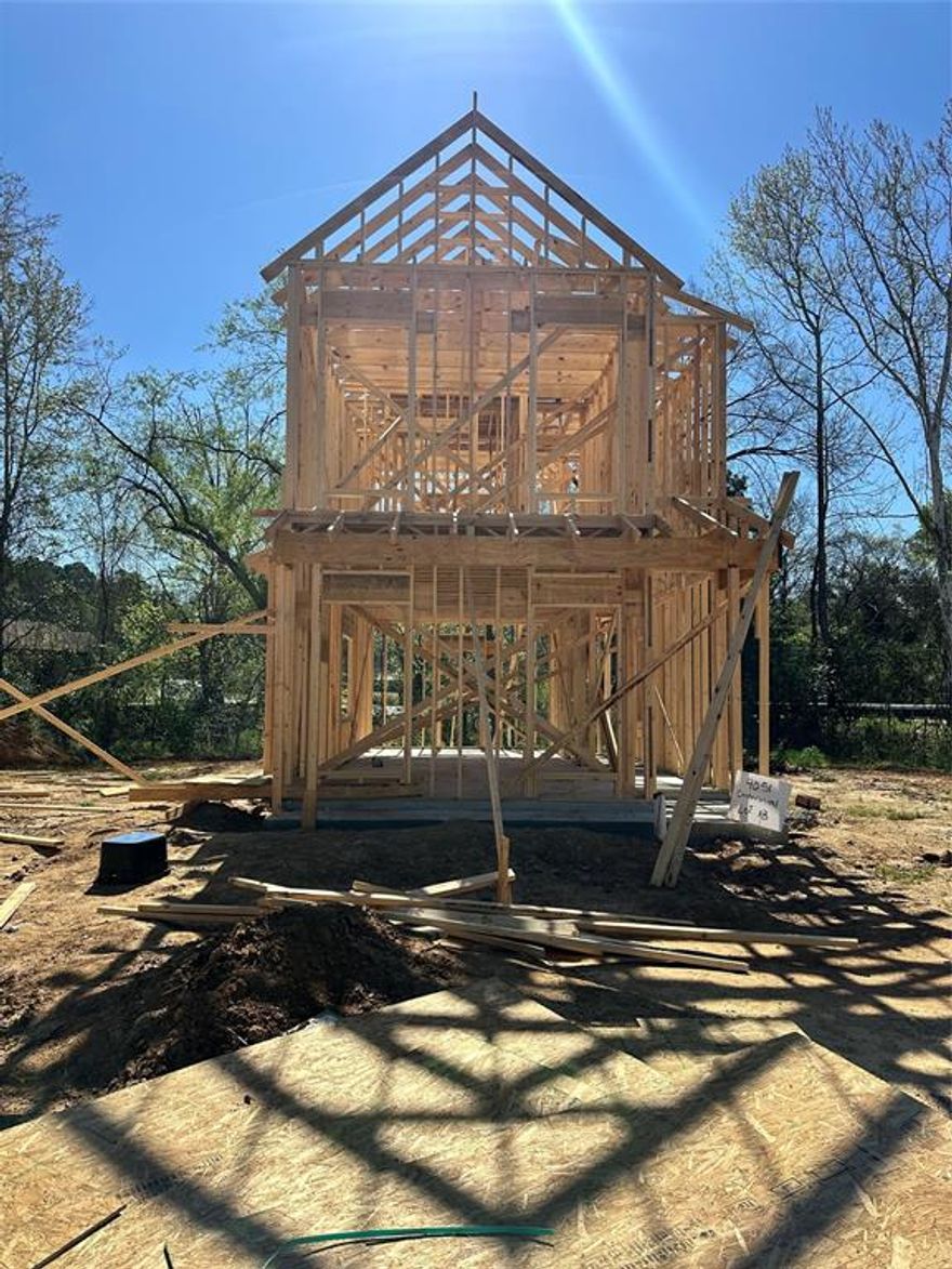 Presenting a delightful two-story patio home that is currently under construction in the heart of downtown Greenwood! Just a block away from the town square and Veterans Park, this home features a variety of impressive upgrades, such as quartz countertops, a stackable washer and dryer, radiant barrier roof decking, and an electric fireplace in the living area. The staircase is adorned with stylish wrought iron spindles, adding elegance to the space. Downstairs, enjoy the luxury of vinyl plank flooring, while upstairs offers cozy carpeting. The second floor includes two spacious bedrooms and a stunning main bath, complete with tiled surround walls around the tub and a quartz countertop. Additionally, the property boasts a privacy-fenced backyard for your enjoyment!