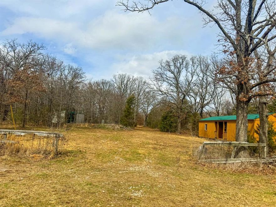 Unrestricted 1.739 acres with approximately 140 feet of FM 515 frontage in Alba, just minutes from Lake Fork.

The 520 sq ft building, constructed in 2024, is fully framed, partially insulated, and wired with windows, door, and window unit installed, ready for you to finish out to suit your business or personal needs. Water and electric are already on site. Ideal for a small cabin, office, weekend retreat, or future homesite.

Property is partially fenced and includes a pond. Also on site is a 38x15 metal structure usable for storage or workshop space.

Sale includes a 25% ownership interest in the adjoining 2.718 acre tract (Wood CAD #20409511) located at the rear of the property, which has a leaseback to Lake Fork.

With no known restrictions, this property offers flexibility for RV setup, boat storage, small business use, or building your home near the lake.