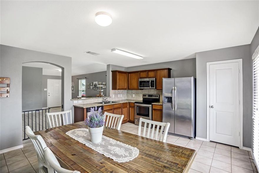 Welcome to this attractive 4-bedroom, 2-bath brick home located in the rapidly growing Travis Ranch community of Forney—a premier, master-planned neighborhood nestled near the shores of Lake Ray Hubbard.  This home offers a spacious, open-concept layout featuring a large living area with a passthrough bar that connects seamlessly to a stylish kitchen complete with stainless steel appliances, granite countertops, a pantry, and a casual dining space. The private primary suite includes an en suite bath for your comfort. Additional highlights include a separate laundry room, a fenced backyard with a patio—perfect for outdoor entertaining—and plenty of room for your family or guests.  Travis Ranch residents enjoy access to resort-style amenities including a community pool, splash park, inline hockey rink, playgrounds, and more. Located within the acclaimed Forney ISD, the neighborhood is home to Lewis Elementary School and offers access to innovative educational opportunities for all ages, including college and community courses.  Don’t miss this opportunity to own a beautiful home in one of Forney’s most desirable neighborhoods and finding your Piece of Texas!