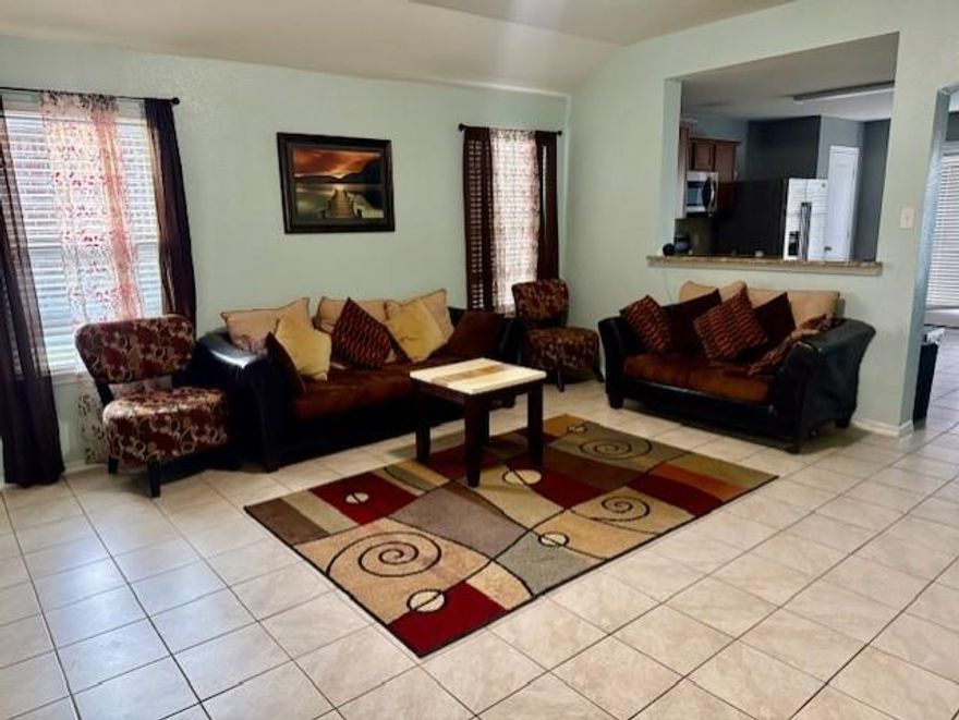Seller is offering $2,500 toward the buyer’s closing costs with an acceptable offer.  Welcome to this attractive 4-bedroom, 2-bath brick home located in the rapidly growing Travis Ranch community of Forney—a premier, master-planned neighborhood nestled near the shores of Lake Ray Hubbard.  This home offers a spacious, open-concept layout featuring a large living area with a passthrough bar that connects seamlessly to a stylish kitchen complete with stainless steel appliances, granite countertops, a pantry, and a casual dining space. The private primary suite includes an en suite bath for your comfort. Additional highlights include a separate laundry room, a fenced backyard with a patio—perfect for outdoor entertaining—and plenty of room for your family or guests.  Travis Ranch residents enjoy access to resort-style amenities including a community pool, splash park, inline hockey rink, playgrounds, and more. Located within the acclaimed Forney ISD, the neighborhood is home to Lewis Elementary School and offers access to innovative educational opportunities for all ages, including college and community courses.  Don’t miss this opportunity to own a beautiful home in one of Forney’s most desirable neighborhoods and finding your Piece of Texas!
