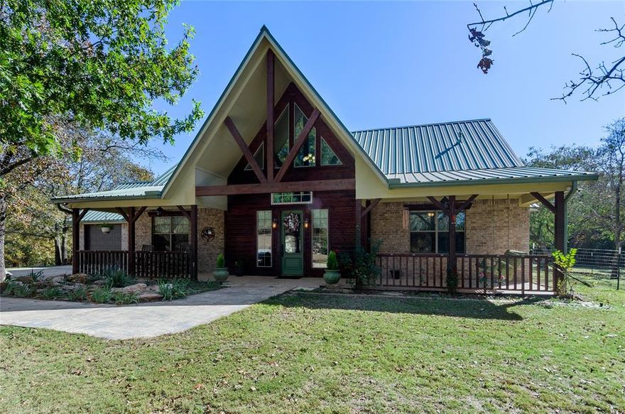 Welcome to your own slice of paradise! This stunning 14+ acre property offers the perfect blend of peaceful country living and modern convenience. Surrounded by nature with unparalleled privacy and space, this property boasts a wooded backyard perfect for wildlife watching, exploring, or simply enjoying the serenity. With over 14 acres, there’s ample room for outdoor recreation, gardening, or future expansion. Step inside to find a bright and open living room with soaring ceilings and an abundance of natural light. The eat-in kitchen is complete with quartz countertops, double ovens, a spacious island, and tons of cabinet space. A built-in desk provides the perfect work nook, while the pretty sunroom offers a peaceful spot to relax with a morning coffee. The primary bedroom suite is a true retreat, featuring a luxurious ensuite bathroom with a soaking tub and an enormous shower with dual rainfall showerheads. A secondary primary bedroom downstairs also includes a private ensuite, ideal for guests or multi-generational living. Upstairs, a dedicated game loft with an office, gaming area, and versatile bonus room provides endless entertainment options for family and friends — plus a balcony overlooking the pool and outdoor living area. Step outside and unwind in your own resort-style oasis. Enjoy the sparkling pool and outdoor kitchen — perfect for hosting gatherings or simply taking in the peaceful country sunsets. Equipped with propane, well water, septic, and three convenient RV hookups, this property offers both comfort and independence. A massive 30x40 insulated shop with electricity, fully wire with 220v circuits and its own bathroom is ideal for hobbies, projects, storage, or even a home-based business. Great location less than a mile from Bowie Airport. Experience the best of both worlds — the privacy and quiet of the countryside combined with the modern amenities and space you’ve been dreaming of.