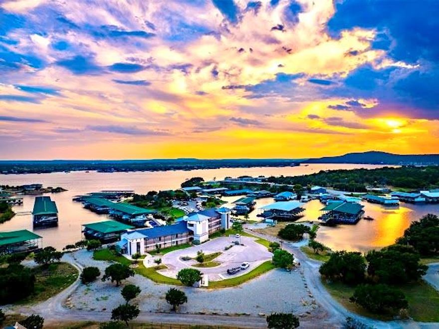 STUNNING FURNISHED, TURN KEY, HARBORVIEW WATERFRONT CONDO with Excellent Overnight Rental History, on Breathtaking Possum Kingdom Lake. Looking for the BEST in Care Free Condo Living at PK? Then this Gorgeous Condo is it, with a Lakeside Pool and Hot Tub, Fitness Center, Spa, Fire Pit, Outdoor Grilling Pavilion, and Panoramic Lake Views over the Marina, and Walking Distance to everyone's favorite waterfront, Restaurant Hemingways. This Ideal Location on the Peninsula is also close to all the Lake Amenities, and Hiking and Biking Trials nearby. This Condo is on the 3rd Level with Exceptional, Elevated Lake Views from Expansive Windows and has the Perfect Open Concept, Light and Bright Living Design, making it the Perfect place to Entertain all your Family and Friends, and Offset expenses with VRBO & Airbnb Rentals as well. So whether you are looking for a Resort, Getaway Condo or an Investment Property, or both, this PK Lake Condo has it all. Find out what PK Paradise is all about.......