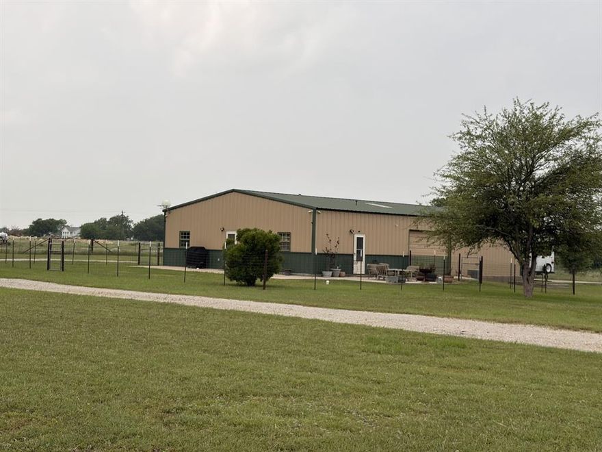 Great barndominium 1bed, 1 bath, with 1600 sq ft shop with 2 rollup doors, concrete floors, custom cabinets, fenced yard, patio, trees, sets back from county road for privacy, corner property, 10.8 acres, water well and septic, RV hookup with 30 and 50 amp and concrete parking, carport, secluded, quiet and peaceful living.