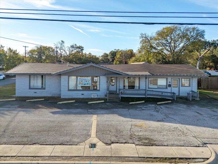 Instant cash flow and prime corner exposure in Richland Hills! This property features two commercial buildings totaling 3,816 sq ft—one leased and producing income. The main building (2,816 sq ft) offers recent updates, including roof and HVAC replacements within the last 5 years and a 2017 water heater. The back building (1,000 sq ft) has new carpet, fresh paint, a private office, open work area, small kitchen, bathroom, and a fully floored attic for storage. Both buildings have roofs and HVAC units replaced in the past 5 years.

Enjoy approx. 14 parking spaces, including 2 covered spots, with front and rear access. Property is fenced along the back and west side and includes a high-visibility lighted pole sign. Convenient access from Glen Hills behind the main building. A turn-key investment in a high-traffic location!