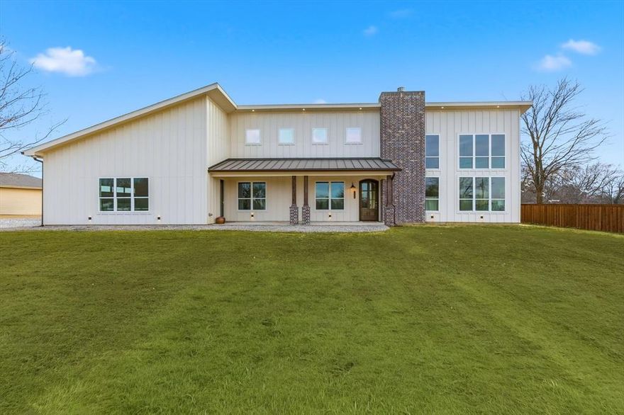 Modern Estate with Vintage-Inspired Details on One Acre, Attached Workshop & Sauna

This brand new constructed home sits on a full acre with mature trees and no HOA, offering privacy, character, and exceptional functionality. The home features approximately 2,000 sqft of heated living space, including a 280 sqft conditioned flex salon suite, and expansive covered porches that seamlessly extend the living space outdoors.

The kitchen blends vintage-inspired elegance with modern luxury, featuring stained upper cabinets, brass hardware and faucets, reverse osmosis filtration system throughout the home and all-white Samsung appliances. Thoughtful finishes throughout create a timeless aesthetic, complemented by the fully spray-foam insulated structure for energy efficiency, comfort, and quiet.

The 1,120 sq ft attached insulated workshop boasts 12-foot ceilings, dual oversized garage doors, 220V electrical, and a private built-in sauna, ideal for luxury vehicle storage, RVs, hobbies, or business use.

Additional highlights: Septic system-no city sewer bills (No HOA restrictions)  Surrounded by higher-value homes. Conveniently located near Melissa ISD and town amenities

A great opportunity to own a modern estate with vintage-inspired details, combining upscale living, versatile spaces, and distinctive character on a prime acre.