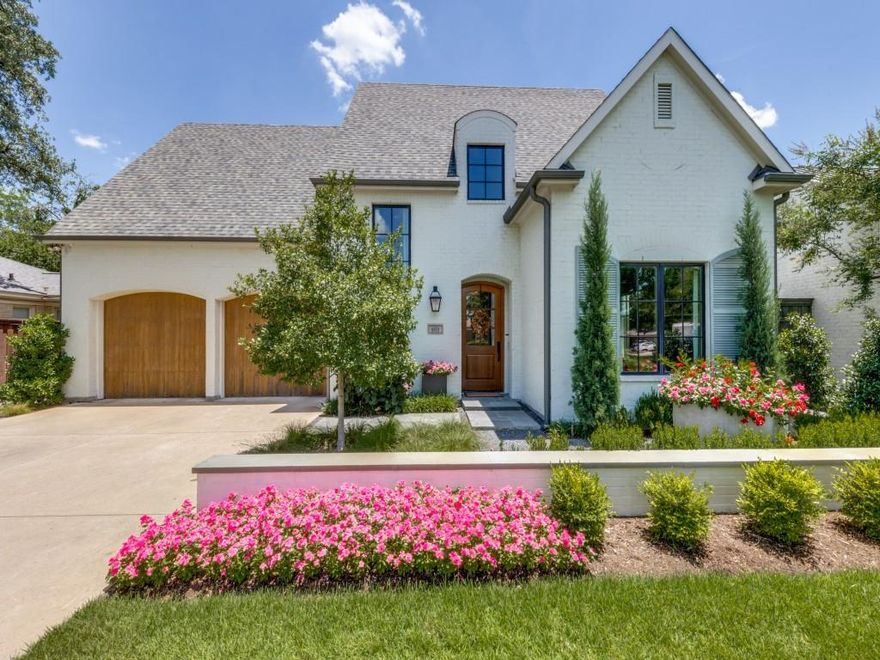 Welcome to this reimagined Bird Streets beauty, thoughtfully redesigned by renowned local talents Urbanology and Ashleigh Graber Design. Every inch of this home has been carefully curated, offering stylish surprises around every corner.
A striking wood-paneled staircase greets you upon entry, setting the tone for the designer finishes throughout. The front study is a cozy, private retreat, perfect for working from home. A walk-in pantry and wet bar thoughtfully separate the formal dining room from the open-concept kitchen, which flows seamlessly into the living room and breakfast nook.
The first-floor primary suite offers serene views of the backyard and pool, with a spa-like bathroom and a custom-designed closet maximizing space and function. Upstairs, you’ll find three additional bedrooms, each featuring bespoke wallpaper and custom paint. A stylish upstairs lounge with built-ins, designer lighting, and rich textures is perfect for movie nights or relaxing.
Hidden doors throughout the home add a playful and practical touch—one reveals a spacious storage room ideal for toys or seasonal items, while another opens to a bonus flex space that could serve as a home gym or fifth bedroom.
Step outside to a beautifully turfed backyard with lush landscaping, a resort-style pool, and a lighted pergola. The outdoor kitchen includes a grill, island, sink, and refrigerator and freezer drawers, creating an ideal setup for entertaining. For the little ones, a custom-built playhouse—complete with air conditioning and modeled after the main home—adds a whimsical finishing touch.