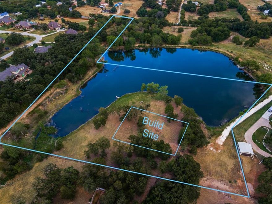 Build your dream home on this treed acreage with a pond outside the city limits in Mansfield. Enjoy country living and highly rated Mansfield Schools.(Boundary lines on the photo's are approximate)