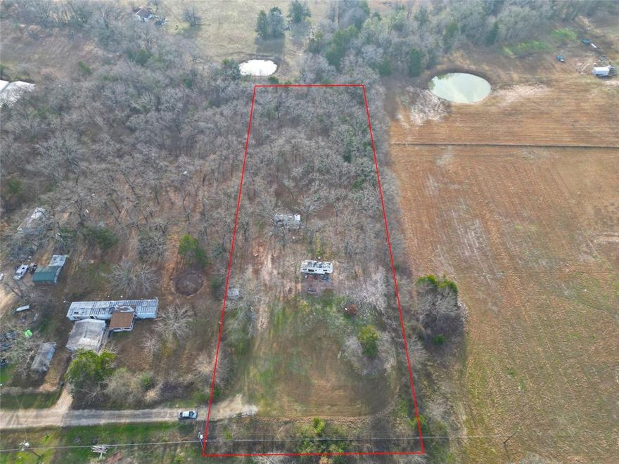 Build with confidence on this 2-acre tract, with utilities already in place. The property is fully fenced and equipped with existing electric and water meters, saving both time and upfront development costs. With no known deed restrictions, this land opens the door to a wide range of possibilities for a custom home, barndominium, manufactured home, or a long-term investment hold. Tucked away while still providing convenient access to town amenities and major routes, this parcel delivers privacy without sacrificing practicality. Terrell is a fast-growing city known for its mix of small-town charm and modern development. Whether you’re looking for a peaceful getaway or your forever homesite, this property delivers opportunity and location. Claim Your Piece of Texas!