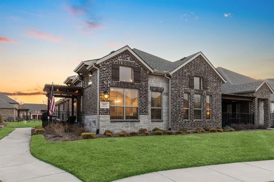 Tucked within the heart of Windsong Ranch, 3881 Marigold Lane offers a rare blend of low maintenance living, thoughtful design, and resort level amenities in one of North Texas most celebrated communities.

Designed for those who value simplicity without sacrificing style, this two bedroom two bathroom villa lives comfortably and efficiently, ideal for downsizers, busy professionals, or anyone seeking a true lock and leave lifestyle. Charming curb appeal and a private courtyard patio create a welcoming first impression and provide the perfect space for morning coffee or relaxing evenings with minimal upkeep.

Inside, light filled open concept living creates an inviting atmosphere. The kitchen anchors the home with crisp cabinetry, generous island seating, stainless steel appliances, and seamless flow into the dining and living areas. Tall ceilings and well placed windows elevate the space, making it feel larger and brighter.

The primary suite offers a calm retreat with excellent storage and a well appointed bath featuring modern finishes and a spacious walk in shower. A secondary bedroom provides flexibility for guests, while the dedicated flex or office niche offers a smart work from home solution.

Storage is thoughtfully integrated throughout, a rare find in villa living. The private courtyard and low maintenance exterior allow for more time enjoying life and less time on upkeep.

Windsong Ranch residents enjoy access to exceptional amenities including the Crystal Lagoon, miles of trails, fitness and wellness facilities, and year round community events.

Recent updates include a new 30 year roof installed two years ago and new luxury flooring installed three years ago.