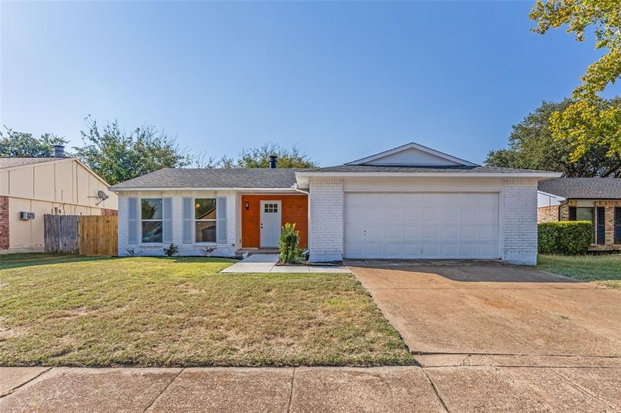 Welcome home to this beautifully updated three bedroom two bath residence in the established Summerfields neighborhood of Fort Worth. This move-in ready home features a bright open floor plan with vaulted ceilings decorative beam and a cozy brick fireplace. The freshly painted exterior and landscaped yard create instant curb appeal while the light neutral interior and luxury vinyl plank flooring provide a modern touch.

The kitchen offers stainless steel appliances white shaker cabinets granite style countertops and a subway tile backsplash. Both bathrooms have been fully updated with stylish tile work and new fixtures. The primary suite includes a walk in closet and private bath.

Enjoy the spacious fenced backyard with a covered patio perfect for entertaining or relaxing outdoors. Conveniently located near top rated Keller ISD schools parks shopping and dining with easy access to major highways. This home blends comfort style and location for the perfect North Fort Worth lifestyle.