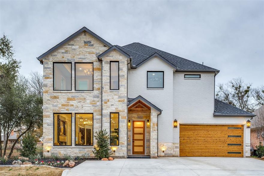 Luxury Living on the 18th Hole at White Bluff Resort

Experience refined luxury and breathtaking golf course living in this stunning two-story modern farmhouse with Hill Country influences, perfectly positioned on the 18th hole of the White Bluff Golf Course. Offering 2,984 square feet of thoughtfully designed living space, this exceptional home blends elegance, comfort, and resort-style amenities.

The striking stone and brick exterior is complemented by beautiful, manicured landscaping and impressive curb appeal. Inside, you’ll find high-end finishes throughout, including rich hardwood floors, custom cabinetry, and designer fixtures that elevate every space.

This four-bedroom home features two private primary suites, ideal for multigenerational living or hosting guests in comfort and privacy. One secondary bedroom is perfectly suited for use as a media or flex room, with a convenient half bath adjacent to a full bath.

Each primary suite boasts a stunning, spa-inspired bathroom, designed to rival a luxury resort. These elegant retreats feature expansive walk-in showers, beautiful freestanding soaking tubs, premium tilework, upscale fixtures, and thoughtfully curated custom towel and linen spaces, creating a true sanctuary for relaxation and indulgence.

The chef’s kitchen is a showpiece, equipped with premium built-in appliances, including a refrigerator, dishwasher, range, microwave, and dual wine coolers—one in the kitchen and another in the outdoor living area—perfect for entertaining.

Outdoor living is truly exceptional, with two covered patio areas overlooking the golf course, complete with an outdoor kitchen and sleek glass railings that preserve the spectacular, unobstructed views of the fairway and greens.

Designed for both everyday luxury and unforgettable entertaining, this home offers the perfect balance of modern farmhouse charm, Hill Country character, and upscale golf course living.