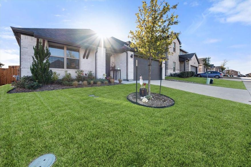 4-3-2 One Story Modern elegance and comfort with an office area. Built by Trophy Homes and Ready Now. This stunning floorplan offers designer finishes, oversize lot and a fresh contemporary exterior that makes a beautiful first impression. 
Natural light pours in through oversized windows and high ceilings, especially in the serene primary suite that is your private retreat to unwind and recharge. Just around the corner, a thoughtfully placed home office area inspires creativity and provides easy access to both the covered patio and modern kitchen when it’s time for a break. 
At the heart of the home is the open-concept great room that blends style and function with a chic dining space, expansive kitchen island, gas cooktop, and a striking modern electric linear fireplace with glass media that adds warmth and sophistication. Clean lines, beautiful color selections, and a calm, airy palette make this home feel both elevated and welcoming. 
Three additional bedrooms are tucked quietly toward the front of the home, offering privacy and flexibility for family, multi-gen, guests, or hobbies. Step outside to enjoy an oversized backyard, a rare find that is perfect for relaxing, entertaining, or creating your own outdoor oasis.
Located in a vibrant community featuring a large fishing pond, resort-style pool, playground, dog park, jogging paths, and greenbelts, this neighborhood truly offers a lifestyle, all served by highly regarded schools and zoned for the new Eagle Mountain High school.
Immaculate, thoughtfully designed, and move-in ready. This home is Clean, Special, and absolutely Beautiful.