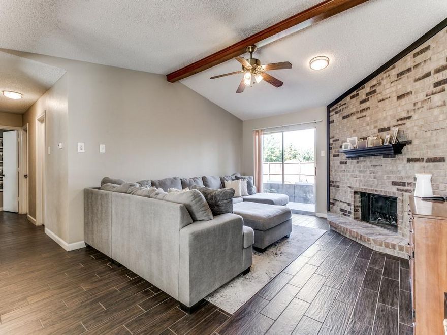 Nicely updated 3 bedroom home in Coppell ISD with neutral paint and clean porcelain plank floors throughout! Large Family Room with cozy brick fireplace open to the dining area with updated lighting. Beautiful kitchen with granite, updated cabinets, designer backsplash, SS gas range, dishwasher & refrigerator included. Large master bedroom with updated ensuite bath with walk in shower, granite & walk in closet. 2 spacious secondary bedrooms share hall bath with granite & tub shower combo. Situated on quiet cul-de-sac with large fenced backyard with open patio. Lease includes professional yard care, pest control & HVAC Maintenance. 10 minutes to DFW Airport!