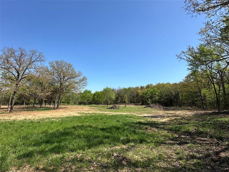 Welcome to Kirkpatrick Estates! 5 beautiful lots located just east of Gainesville off 82.  Lot 2 has large beautiful trees and perfect building spots.  The lots have been cleared and ready to build! Co-op water and electric are available. Callisburg school district. Barndos allowed, no mobile homes.