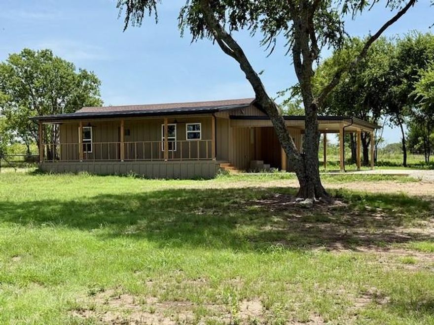 County living on 3.2 acres. This home has recently been remodeled with plenty of land to build another home, barn or a tack room for horses or livestock. This home is outside the city limits of Waxahachie and is in Maypearl ISD. You will find a large covered front porch, 3 bedrooms and 2 bathrooms, all appliances updated, all cabinets updated and granite counter tops. HVAC recently replaced. Freshly painted and all floors recently replaced. The oversized covered carport has additional storage and room for a second washer and dryer if needed.