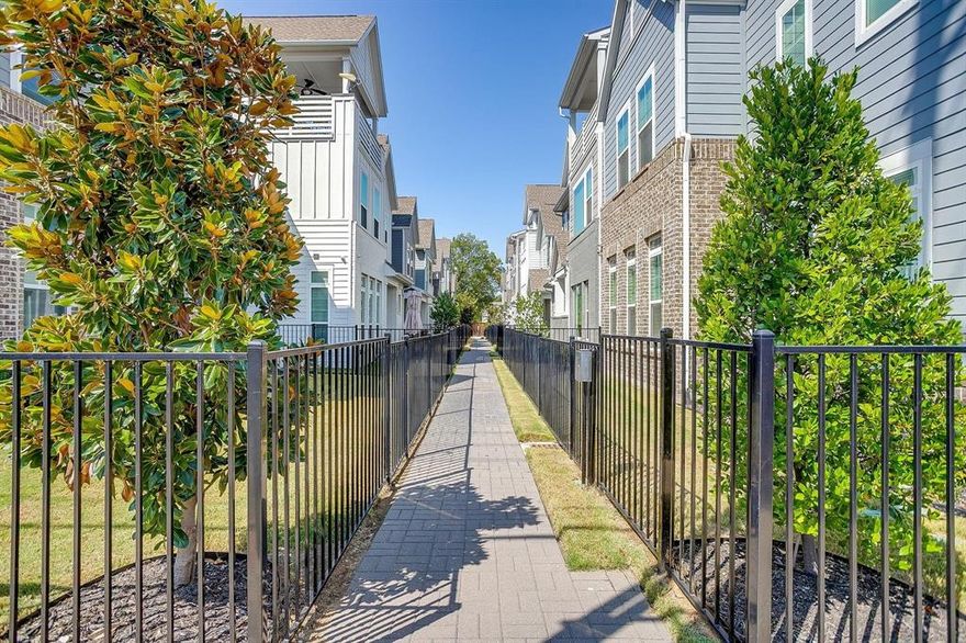 The Edgewater community was established for connection and walkability to the amazing amenities within Fort Worth's River District including convenient access to the Trinity Trails! On the market for the first time, this 2021 build is a low maintenance single family home (no shared walls!) featuring 3 bedrooms, 3.5 bathrooms, 2-car rear entry garage and 3 living spaces! Thoughtfully designed, this home's highlights are the wood floors, storage space, nice size rooms, open design and custom upgrades. A guest favorite is the bar just off the dining space with custom wallpaper, hardware, wine refrigerator and bright cabinetry adding a fun pop of color and style! Walking up the custom stair-runner to the 2nd floor is a 2nd living room and all of the bedrooms with the primary suite being split from the 2nd and 3rd bedrooms. The full capacity laundry room resides on the 2nd floor  as well, while on the 3rd floor is another oversized living room, full bathroom and the best outdoor balcony you'll find! The views and the breeze from the balcony will make your sunrise coffee and your sunset happy hour a completely delightful daily experience! Not only is this home perfect for urban living on the west-side of Fort Worth, it's also perfect for entertaining and wonderfully adaptable to 2nd home, lock and leave living. Take a tour and fall in love with all that living here has to offer!