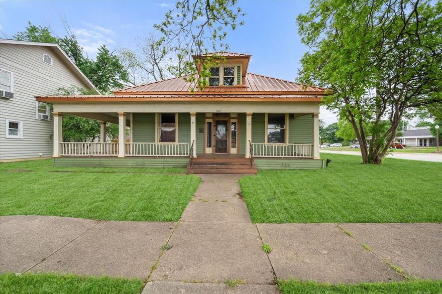 BACK ON MARKET at NO fault of Sellers!!!! They just don't build them like they used to, and 607 West Brown is built like they used to! Located in the heart of Ennis, just steps from Historic Downtown, there's endless opportunity for this 1945 home. For the business owner, this property offers plenty of conference rooms or meeting space, rooms for private offices, and a full kitchen! For the homeowner, double living areas and a dining room make it the perfect place to host! The wrap around porch offers the perfect spot to relax after a long day!