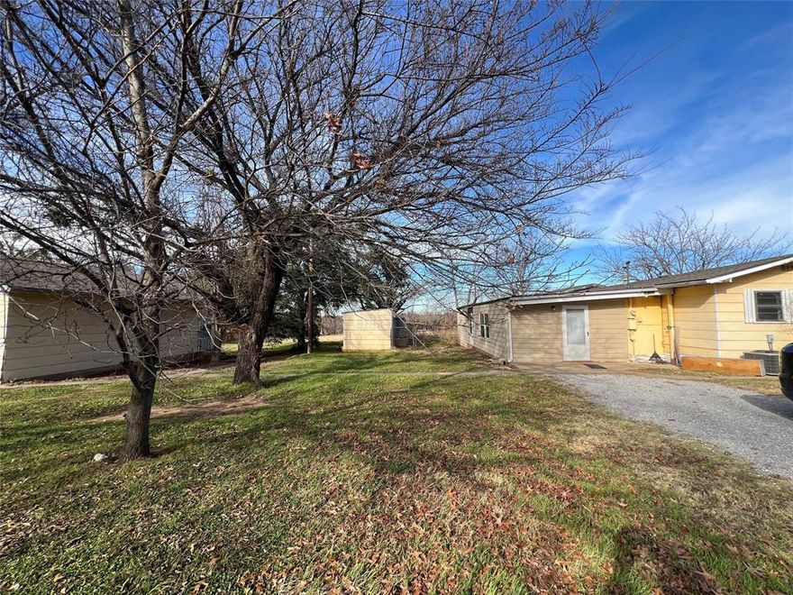 This versatile property offers endless possibilities on 2.56 acres of usable land. The main home features three bedrooms and two bathrooms, plus an additional bedroom and second living area, providing flexible space for extended living, rental use, or home office needs. A standout feature is the detached shop with its own bathroom, making it ideal for a home-based business, workshop, or future income opportunity. With ample space both inside and out, this property is well-suited for investors.