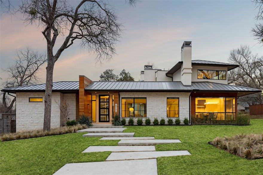 Step out of Dallas, TX and into a gorgeous, stylish, custom Scott Briggs build. This home is a light, bright, sleek and sophisticated transitional contemporary style, ideally located on a corner lot in a quiet cul-de-sac in the highly sought after neighborhood of Janmar. The interior greets you with meticulous finishes, an open floor plan, oversize rooms and loads of natural light. You will find a chef-inspired kitchen, oversize living space, guest bedroom with ensuite bath, study or additional guest bedroom, and primary bedroom with designer bathroom and custom closet on the first floor. Ascend the grand staircase with stunning chandelier to an additional living space, two bedrooms with ensuite baths, and outdoor living space as well as an additional laundry room. No detail overlooked in this beautiful entertainer’s paradise! Schedule your showing today.