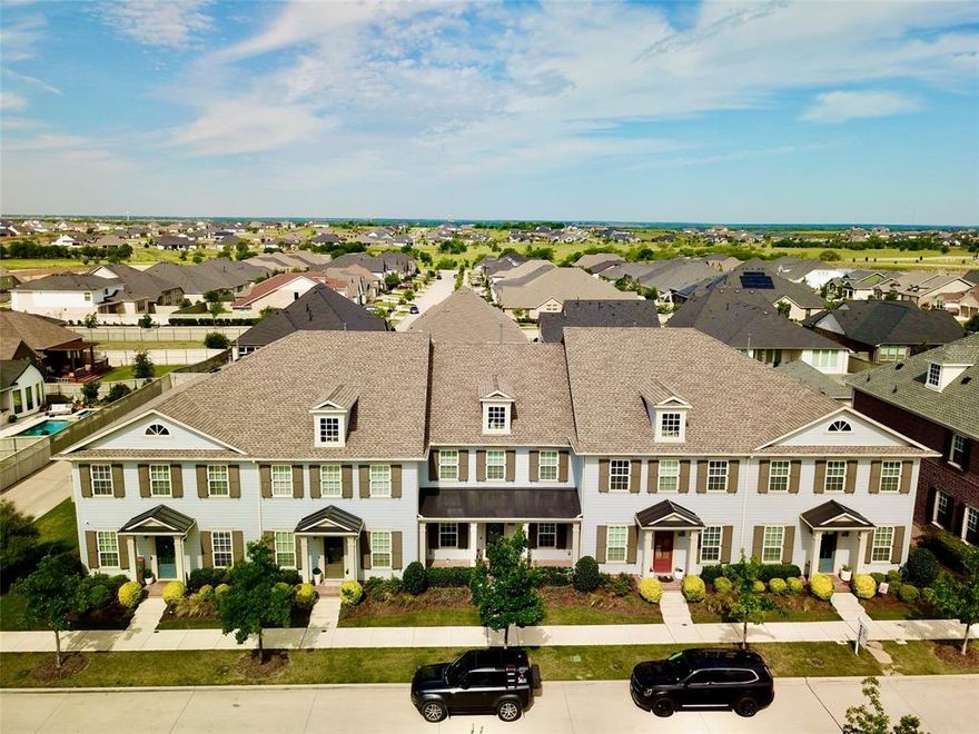 Welcome to this exquisite home nestled in award winning Pecan Square, Small Town Life, reinvented! This beautifully designed residence boasts a classic exterior with modern touches, featuring a welcoming front porch & meticulous landscaping. The home's upgrades & owner updates of 2.5 baths, new carpet, fresh paint, & shiplap accent walls create a custom home. This low-maintenance townhome's fully turfed backyard & beautiful, mature magnolia tree create an outdoor oasis. From the front door, you're just steps away from the Town Square; multiple resort pools; pickleball & basketball courts; The Barking Lot dog park for large & small furry family; fitness center; multiple playgrounds & open air walking or running spaces; parks; convenient Amazon locker; The Arena, a multi-purpose space for fun including sport activities, barbecue cook-offs, Farmers Market highlighting fresh, local produce, and an array of music festival featuring the best in local bands, not to mention a full calendar of monthly and annual community-wide activities and events to celebrate with your neighbors as you become part of this charming community! The Townhome HOA includes all exterior upkeep, such as lawn and flower bed irrigation, lawn care, landscaping, and general exterior maintenance which gives owners time to enjoy life in the active neighborhood that residents love being part of!  This home is a true gem, ready for move in -- welcoming you to a life of comfort and style. Pecan Square is where people gather to share the very best of life: local foods, music, crafts, and everything that matters most. Pecan Plaza, a new retail development at FM 407 @ Cleveland-Gibbs Road now under construction include CVS, Hand & Stone Massage, and Hashtag India, bringing everything from everyday essentials to elevated self-care and global flavors just minutes from home. The growing lineup will also feature a mix of restaurants, a salon, a juice bar, and a Pilates studio.
