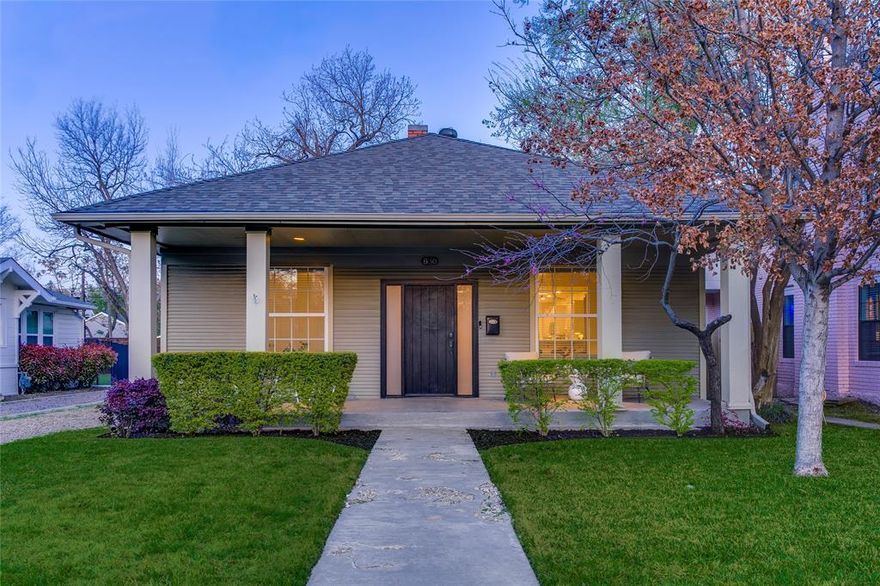 Walkability to your favorite shops and restaurants? Check. Quaint, tree-lined streets in a picturesque neighborhood? Check. Spacious backyard with additional storage? Check! Welcome home to this lovingly restored and well cared for bungalow in the heart of North Oak Cliff! Situated on one of the most coveted streets in Kessler Square, this adorable cottage brings curated, thoughtful updates to the forefront while honoring the character and charm of a 1920's home. Step inside to rich hardwood floors throughout the expanded living and dining areas, along with 9ft ceilings and an abundance of natural light in every room. Formals have a seamless flow into the spacious kitchen where you'll find shaker style cabinets, new stainless steel appliances, and sleek, easy-to-maintain stone and granite accents. The separate primary offers an en-suite bathroom and an expansive walk-in closet, along with a beautiful decorative fireplace adding that touch original charm you love to see preserved! Two additional bedrooms with another large bathroom are located at the back of the home for additional space and privacy. And out back, enjoy dinners al fresco on the new deck overlooking your gorgeous backyard. Additional noteworthy updates include: new roof 2026, new sprinkler system 2025, new windows 2025, and more. Whether you're spending your afternoons in nearby Bishop Arts District or out on the green at Stevens Park Golf Course, you're sure to find so many fun things to see and do while living in the middle of it all in this North Oak Cliff beauty.