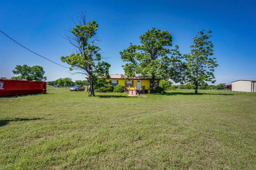 1 acre of commercial land directly off of the highway.  Located near several established businesses, this 1-acre parcel offers and excellent opportunity for commercial or mixed-use development.  

Features - No zoning restrictions, water and electric already connected, close to high traffic areas and local businesses.

Mobile home and two storage buildings on site - to be removed by buyer.