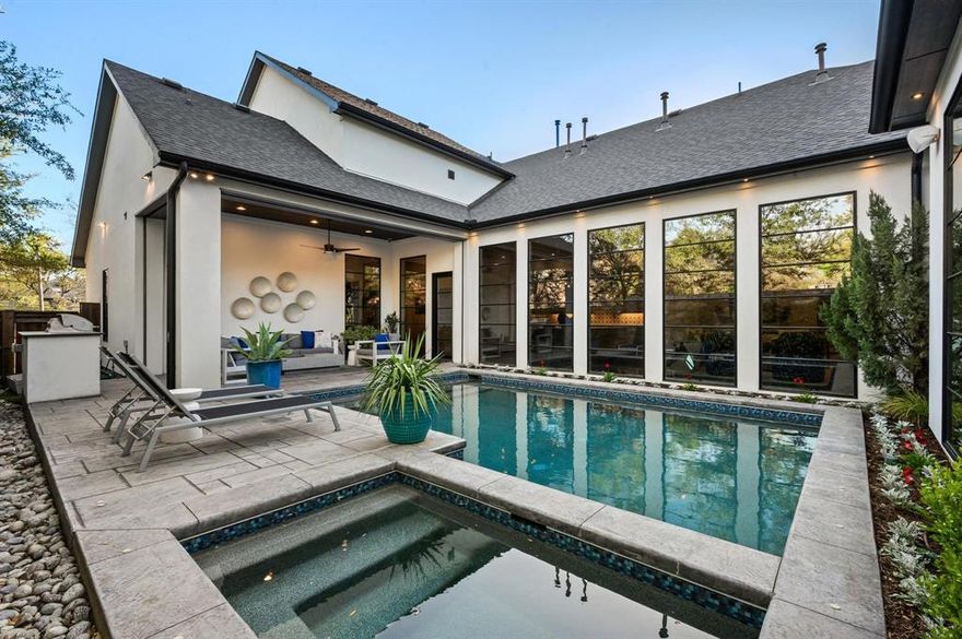 Tucked behind the gates of Forest Estates, this 2019 custom home delivers the floor plan buyers want but rarely find: a primary suite and guest suite both downstairs, a private study, and an entertainer’s kitchen that opens seamlessly to a heated Pebble Tec pool and spa.

The kitchen is the heart of the home, featuring a Wolf range, Sub-Zero refrigeration, marble countertops, an oversized island, a walk-in pantry, two built-in wine refrigerators, and a Restoration Hardware chandelier. Hand-laid white oak floors with Brazilian cherry inlays run throughout the home, while stained 12-inch pine beams add warmth and character to the primary suite, study, and game room. The family room is anchored by a 54-inch linear gas fireplace with a ledgestone surround, creating a clean, modern focal point.

The downstairs primary suite feels elevated and private, with designer Brizo fixtures, a freestanding soaking tub, and refined custom finishes. Outdoors, the covered patio with motorized screens sits just steps from a Bull stainless grill, creating an easy indoor-outdoor living experience. Beyond the pool, a turfed dog run and private putting green make the backyard especially rare for this part of Preston Hollow.


Additional highlights include a tandem 3-car garage with epoxy floors and thoughtful custom details throughout. Minutes from NorthPark, Preston Center, Royal Oaks Country Club, Dallas North Tollway, 75, Whole Foods and Central Market this home combines privacy, function, and everyday luxury in one of Dallas’ most convenient locations.
