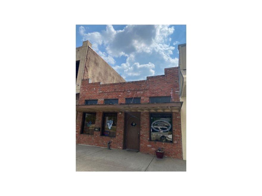 Prime location in the downtown Historic District of Ennis, Tx.  Turn this versatile commercial space into a number of offices for your current business, retail space or a trendy boutiques, options are many.  Don't miss out on the opportunity to continue to preserve this building with grants available through the City.. With the current downtown charm of the brick streets and the historic buildings surrounding the area... with popular events years... this is a super opportunity to own your own little piece of history and charm!