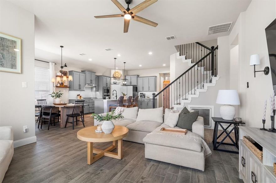 Welcome home to this Stunning two-story gem in Argyle, TX! Step inside this beautifully maintained home and discover comfort, style, and functionality at every turn. The heart of the home is the immaculate kitchen, featuring sleek stainless-steel appliances, a spacious kitchen island, decorative lighting, and ample built-in cabinetry with added lighting, perfect for everyday living and entertaining. The inviting living room offers a warm and cozy ambiance, enhanced by large windows that flood the space with natural light. When it's time to wind down, close the window coverings and enjoy the perfect setting for a movie night. Retreat to the serene primary bedroom, where a rich, calming wall color sets a dreamy tone for relaxation. The luxurious ensuite bathroom boasts dual sinks, a garden tub, and a separate walk-in shower for your ultimate comfort. With a total of five bedrooms and four bathrooms, there’s plenty of space for loved ones and guests. Upstairs, a massive bonus room provides endless possibilities, ideal as a playroom, media room, or dedicated study space. Outside, enjoy the expansive green lawn and a covered patio perfect for outdoor gatherings or quiet evenings. Don’t miss your chance to own this pristine Argyle home—schedule your tour today!