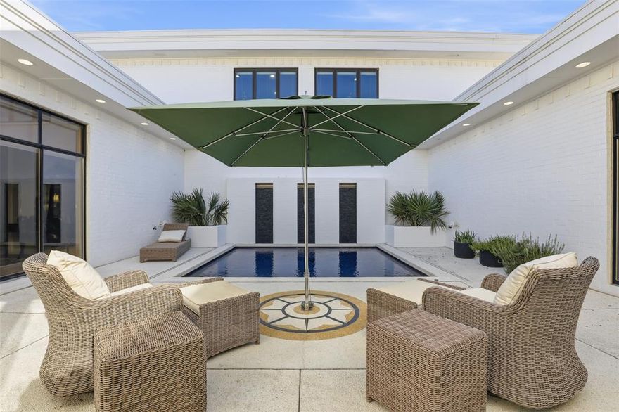 Discover a rare opportunity to own an exceptional piece of modern Fort Worth real estate. Never before listed in MLS, this striking 4,700-square-foot residence blends crisp contemporary design with an inviting retro flair. With generously proportioned rooms, thoughtful architectural details, and outstanding indoor-outdoor flow, 5625 El Campo is a property you won’t want to miss.

This home features 2 bedrooms, 2 full baths, and 3 half baths, with the flexibility to transform the spacious upstairs great room into a third bedroom, private office, or additional living area. The possibilities are endless. Upon entering, you are welcomed by an impressive 23-foot foyer that leads to a sunken bar—an ideal setting for entertaining. Whether hosting dinner in the expansive dining area or relaxing in the oversized living room, the home’s layout offers seamless spaces for gatherings of any size.

The downstairs primary suite serves as a luxurious retreat, complete with wood flooring, abundant natural light, and two large closets offering exceptional storage. The spa-inspired primary bathroom opens directly onto the private pool deck, creating a serene and seamless connection to the outdoors.

The kitchen is thoughtfully designed with contemporary cabinetry, stylish lighting, a gas range, and extensive storage that will satisfy any culinary enthusiast. Upstairs, guests are treated to their own private haven. Separate from the primary suite, the upper level includes a generous guest bedroom, an office area, and a versatile TV-office space that overlooks the sparkling pool—perfect for visitors seeking both comfort and privacy.

This distinctive home combines architectural character, modern amenities, and exceptional livability, making it a standout opportunity in one of Fort Worth’s most desirable areas.