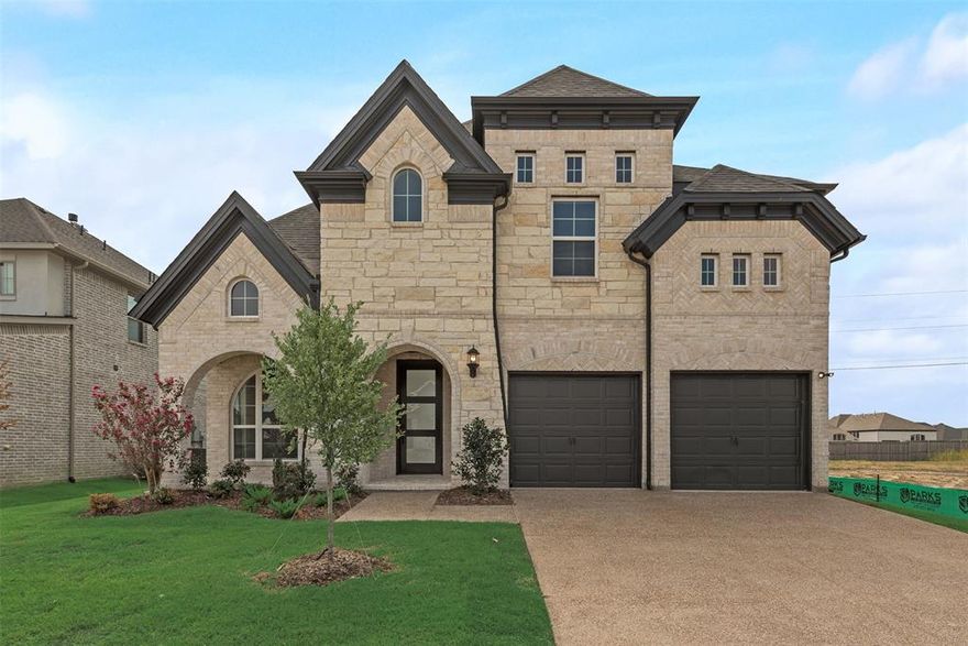 Just completed and move-in ready, this stunning new Grand Home is nestled in a vibrant, master-planned community designed for outdoor living. With striking stone accents, onyx shingles, and a sleek contemporary front door, the curb appeal is undeniable. Located just four blocks from resort-style amenities including a pool, playground, fishing pond, and scenic bike trails, this home offers both luxury and lifestyle. This north facing home sits on a lot that faces a peaceful pond and is backed to a greenbelt with walking trail.
Inside, the design boasts four spacious bedrooms, including a private guest suite on the main floor—ideal for visitors, a nursery, or a home office. The dramatic vaulted family room features rich wood floors, a gas fireplace, and is pre-wired for a flat-screen TV, creating a perfect space to relax or entertain. Formal living and dining areas add elegance and versatility, while upstairs, a large game room and dedicated media room provide fun and comfort for the whole family.
Custom design touches include a sleek staircase with wrought iron spindles, 8-foot interior doors, and Rev Wood flooring. The open concept kitchen is a chef’s dream, with granite slab countertops, Shaker-style cabinetry, a gas cooktop with a sleek stainless and glass vent hood, full bowl sink, trash can drawer, spice cabinet, and an oversized island at the center of it all.
Retreat to the luxurious primary bath featuring a garden tub, Marlana vanities with rectangular sinks, and a glass-tiled walk-in shower. Bedroom four even includes its own private reading loft, adding charm and functionality. This home is also equipped with modern conveniences like a security system, sprinkler system, and energy-efficient construction with R-38 insulation, 2x6 walls, and full Energy Star certification.
With full builder warranties and designer upgrades throughout, this is more than a new house—it’s your new home.