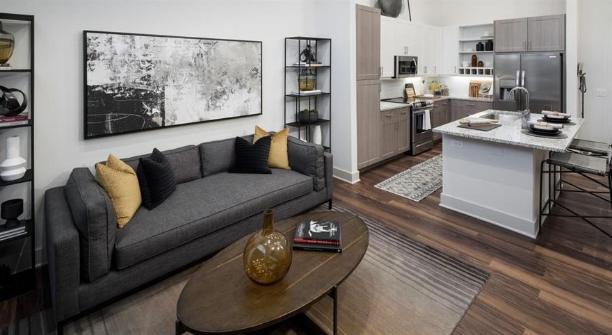 Step into modern living with this stunning apartment, built in 2020 and designed to impress. Featuring soaring 9 to 15-foot ceilings, this spacious residence is filled with natural light and upscale touches throughout. Enjoy designer-inspired finishes, including two-toned contemporary cabinetry, granite countertops, and a stylish tile backsplash that elevates your kitchen space. This vibrant community offers resort-style amenities perfect for both relaxation and entertainment. Lounge by the sparkling pool, unwind in private cabanas, or host friends in the outdoor kitchen and grilling areas. Get competitive in the outdoor billiards and game zone, and let your furry friends play freely in the dedicated dog parks. With modern design, premium features, and a full suite of amenities, this is more than just a place to live, it’s a lifestyle. Schedule your tour today and discover your next home!