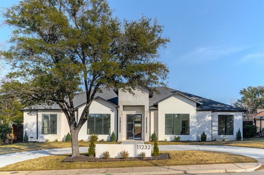 Modern design and refined luxury come together in perfect harmony at the highly coveted Hillcrest Estate. This custom-built masterpiece redefines elevated living, blending sleek architectural elements with effortless functionality and style. From the moment you arrive, the home’s clean lines, expansive windows, and exquisite materials create an ambiance of sophistication and warmth. Step inside to discover an open-concept layout where soaring ceilings and abundant natural light highlight every carefully curated detail. The heart of the home is the stunning kitchen, designed for both culinary creativity and entertaining. It boasts a spacious eat-around center island, a striking glass-enclosed wine display, a 48-inch Thermador gas range, and a built-in 60-inch Thermador refrigerator. The adjoining great room, with its modern fireplace and multi-slide glass doors, flows seamlessly into the dining area and outdoor living spaces, making indoor-outdoor living a breeze. The backyard is a private retreat, perfectly designed for year-round enjoyment. It features a resort-style pool, artificial turf, an outdoor kitchen, a cozy fireplace, and a covered entertaining area. Both the great room and the primary suite open to this serene oasis, inviting you to unwind in style. The expansive primary suite is a showstopper, with tranquil views of the pool and spa. The spa-inspired bathroom offers dual vanities, a freestanding soaking tub, a separate shower, and a custom walk-in closet that’s as functional as it is beautiful. Additional highlights include a flexible office space, a game - media room, four bedrooms, and five full baths, ensuring plenty of space for work, play, and relaxation. Nestled in the prestigious greater Preston Hollow area, this exceptional property is just moments from Dallas’ finest shopping, dining, and top private schools.This is more than a home—it’s a lifestyle. Are you ready to make it yours?