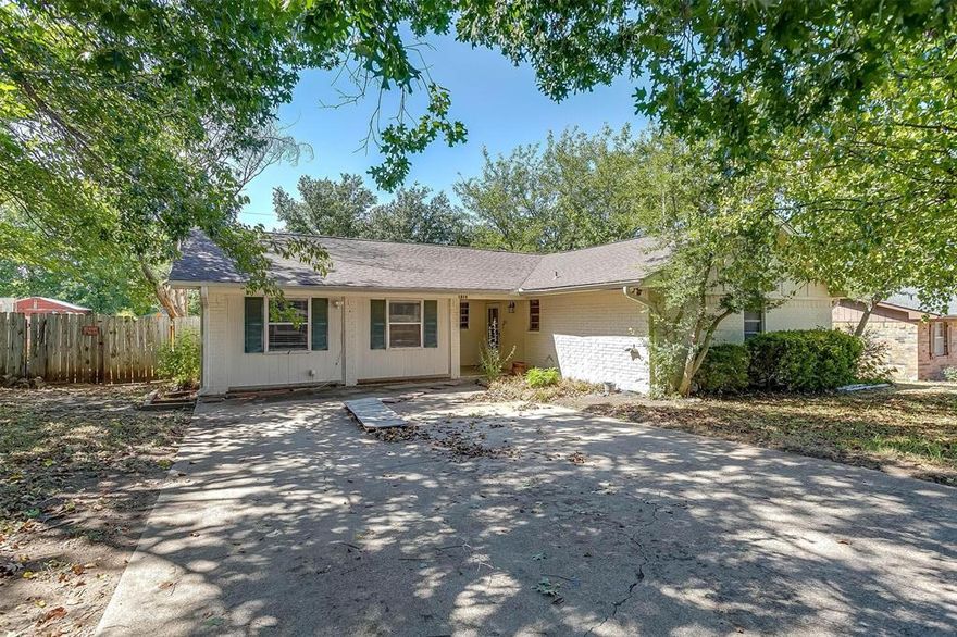 Close to schools, shopping and I-20 you'll find this wonderful brick home nestled in an established neighborhood.  With 3 bedrooms, 2 bathrooms and TWO living areas, there's room for everyone to have their own space. The kitchen has a pantry, stainless appliances and is open to the breakfast room with a bay window.  The 2nd and 3rd bedroom share a jack and jill bathroom with shower.  The master suite is a great size and has double vanities and a walk in closet.  There's an awesome covered pavilion in the backyard to cozy up in on cool evenings.  It won't take much to update this adorable family home and make it yours!  Being sold AS IS- it's a great find for an investor or a family willing to do the work to restore this home to it's original stature.