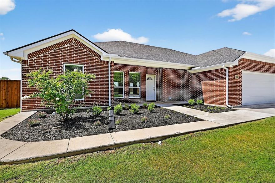 Price Improvement! Welcome to this stunning new 3-bedroom, 2-bath brick home, designed for modern living with an open floor plan that seamlessly blends style and functionality. As you step inside, you’ll be greeted by the warmth of the wood-burning fireplace in the spacious living area, complemented by luxury vinyl plank flooring throughout. The chef’s kitchen boasts beautiful granite countertops, offering plenty of prep space for cooking and entertaining. The vaulted ceiling in the master bedroom adds a touch of elegance, and features an extra-wide entry for enhanced accessibility. The master bath includes extra-wide entryways as well, along with two closets for added space and convenience. Built with lasting quality in mind, the home sits on a solid post-tension slab foundation with peers. The 0.5-acre lot offers a fully fenced backyard that’s a true blank canvas—perfect for a garden, fire pit, pool, or all of the above. Just bring your vision and make it your own! Nestled in the quiet town of Ector, you’ll enjoy peaceful small-town living with an easy commute to Sherman, Bonham, Bells, and even Paris. This modern brick home is move-in ready and waiting for you!