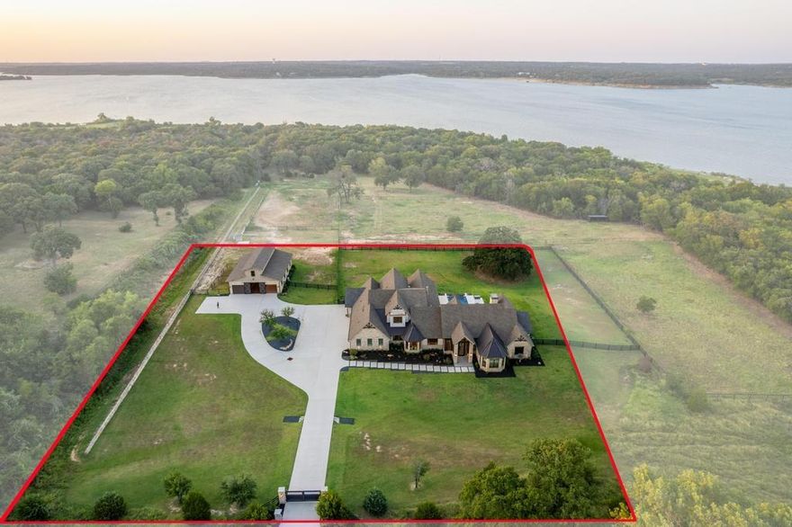 Step into the life, with this 2.5 acre equestrian estate tucked away just yards away from Lake Grapevine in Southlake, TX.  Surround by Corps of Engineer property, and over 6,700 sq ft. of living space, this home offers all your smart home needs in a secluded package just seconds from the trailhead.  Vaulted ceilings, first floor media and gameroom, extensive lighting, and a patio for the ultimate grill master, are just a few of the long list of amenities that went into this well thought out design and finish out.   Although this home is in the middle of the Dallas-Fort Worth metroplex, you'll swear you're country living every time you pull through your gates!