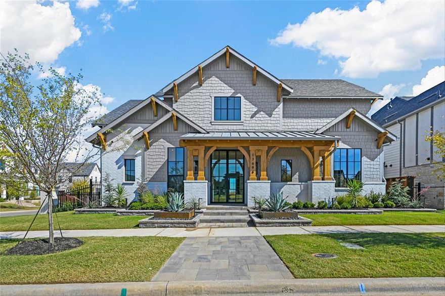 MLS# 20570781 - Built by Huntington Homes - Ready Now! ~ New Sebastian design w-Craftsman elevation & painted brick on corner homesite. Double glass doors & 22 ft ceilings invite you into this show stopper! 3 10ft tall sliding doors bring in an abundance of natural light. Great room w-beams open to luxury kitchen w- Wolf & Subzero appliances, Quartzite c-tops and elegant custom cabinets. Prep kitchen w-icemaker, 2nd sink & 2nd d-w for cooking ease. Primary w-huge shower w- multiple shower heads & freestanding tub, custom closet. Card room w wetbar adjacent to game and media rooms for family fun. All en-suite bedrooms. Glass surround study overlooks patio. Outdoor living w-kitchen, Wolf grill, fridge & sink along with fireplace for relaxing in nature. Front porch overlooks small park, great place to meet your neighbors!!!