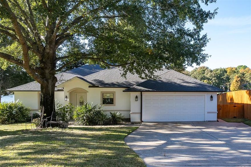 **Lakeside Retreat with Dual Masters** Discover the dream of lake life at this exceptional waterfront home on Cedar Creek Lake in Gun Barrel City.  Thoughtfully designed, this residence stands out with two primary bedrooms and two and half baths, offering an ideal setup for guests, multi-generational living or a perfect roommate scenario.  You will adore the interior floor plan with a built in desk area, fire lit living room and a spacious kitchen and breakfast bar!   The exterior is built for enjoyment. Spend your spare time on the spacious back porch staring at the water. A meticulously maintained lawn frames the lakeside view, leading to your very own private boat dock. Imagine mornings on the water and evenings spent relaxing on the back patio or sinking to the warmth of the outdoor spa hot tub!  Convenience is key with a two-car garage and a prime location that puts you just minutes from popular dining and retail options.  This isn't just a home: it's a lifestyle upgrade. ** Seller is open to providing concessions for interest rate buy-down or any other modifications suitable for buyer**