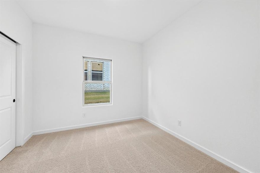 From dawn to dusk and from outside-in, this home is a showstopper! Located in Van Alstyne, Texas and zoned to Van Alstyne ISD, this single-story Goldenrod II features a stunning brick exterior, stone accents, beautiful landscaping, and an open concept floorplan. Off the foyer are two convenient secondary bedrooms and a full bath in between. At the back of the home is the inviting kitchen, great room, and dining area. With gorgeous dark stain shaker cabinets and granite counters lit by black metal shade pendant lights, the kitchen is one to love for years to come. The primary suite and bath will have any homeowner feeling spoiled with the expansive walk-in closet and spacious shower.