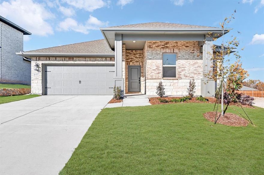 From dawn to dusk and from outside-in, this home is a showstopper! Located in Van Alstyne, Texas and zoned to Van Alstyne ISD, this single-story Goldenrod II features a stunning brick exterior, stone accents, beautiful landscaping, and an open concept floorplan. Off the foyer are two convenient secondary bedrooms and a full bath in between. At the back of the home is the inviting kitchen, great room, and dining area. With gorgeous dark stain shaker cabinets and granite counters lit by black metal shade pendant lights, the kitchen is one to love for years to come. The primary suite and bath will have any homeowner feeling spoiled with the expansive walk-in closet and spacious shower.