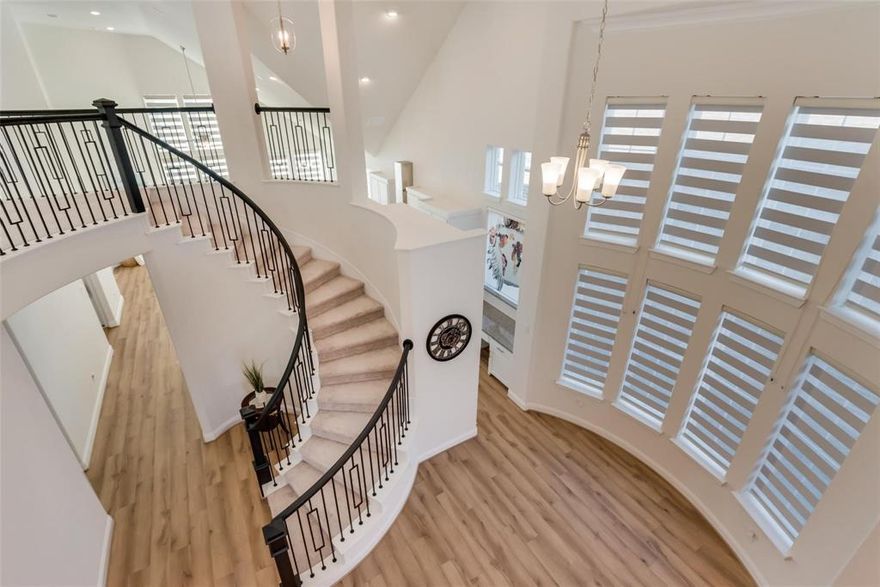 Experience refined living in this stunning 5-bedroom, 4-bathroom home that blends modern sophistication with everyday comfort. From the moment you step inside, you're welcomed by an expansive open-concept layout featuring a spacious living area anchored by a stylish fireplace and a gourmet kitchen complete with granite countertops, a central island, and high-end finishes throughout. A striking wrought iron staircase leads you upstairs to two versatile bonus spaces—perfect for a game room, media room, or home office setup. Whether you're entertaining or unwinding, there's space for everyone. Nestled in a sought-after community just minutes from the best of North Texas, this home offers the perfect mix of privacy and convenience. The eco-conscious design includes solar panels, dramatically reducing electricity bills—especially valuable during those hot Texas summers! Motivated Seller