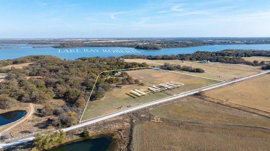 'PROMISE LAND'..Discover the Exceptional Opportunity To Own 11.3 Acs of Prime North Texas Hill Country Land Nestled Along Its Own Picturesque Shoreline of Lake Ray Roberts, w-Unparalleled Potential. This Amazing Waterfront Property Was Formerly A Polo Field & Offers An Unmatched Blend of Natural Beauty, Privacy, & Several Exquisite Building Sites To Choose From Complete w-Magnificent Old Oak & Pecan Trees To Enhance Your Special Dream Home. Best Of All, It's Just 45 minutes from DFW & A Short 10 to 15 Minute Drive To The Quaint Neighboring Towns of Tioga, Collinsville, Pilot Point & Future Route of N Toll Rd Outer Loop, Making The Location Poised for Continued Appreciation. Enjoy Easy Access To Fishing, Hunting, Boating, & Water Recreation Just Outside Your Back Door w-The Vibrant Texas Sunrises & Sunsets As An Added Inspiration. Family Life Becomes Joyous & Fun w-So Much Outdoor Activity To Share Together, Whether It's Horses You Love Or That Pool You've Been Wanting. How About A Lovely Walk Around Your Perimeter Walking Trail, Then Following It Up w-A Cup of Coffee In Your Outdoor Entertainment Gazebo w-Its Lovely Views. This Property Creates An Inviting Atmosphere Perfectly Suited for Agricultural Ventures w-Its Desirable Sandy Loam, Improved Coastal Pastures. The Surrounding Neighborhood Is Amazing w-Its Country Life On Full & Beautiful Display, But Perhaps Most Of All, Are the Wonderful People Who Live Around You. This Property Is Agricultural Exempt for Lower Property Taxes & No City Taxes w-Access for Woodbine Water Meter & PenTex Electric Available. Top-Rated Callisburg or Tioga Schools.