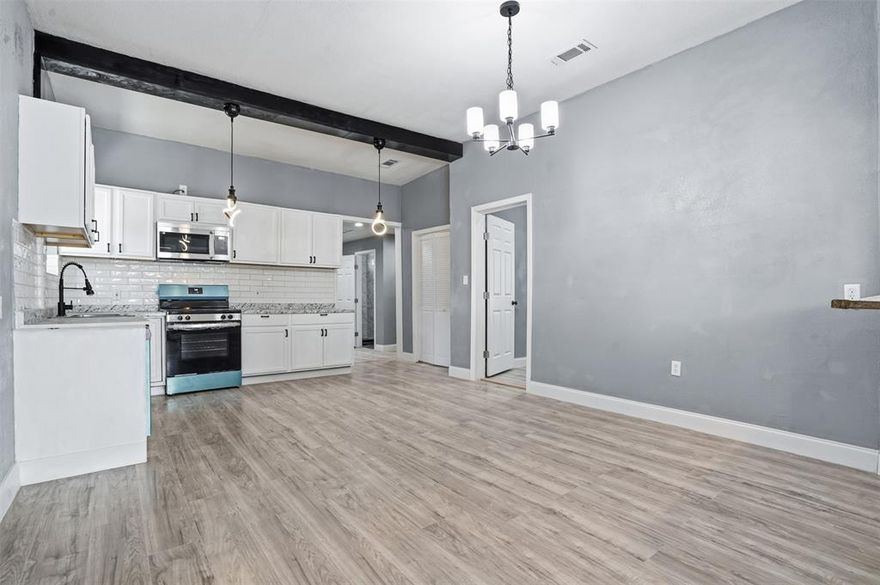 Fully remodeled and move-in ready, this 3-bedroom, 2-bath home offers a rare opportunity to own a character-filled property just minutes from Downtown Fort Worth—with owner financing available on fair terms.  Originally built in 1930 and thoughtfully updated, this home blends classic charm with modern upgrades throughout. Inside, you’ll find an open-concept layout featuring luxury vinyl plank flooring, updated lighting, and a striking exposed beam that adds warmth and character to the main living space.  The kitchen has been completely renovated with white shaker cabinets, granite countertops, subway tile backsplash, and brand-new stainless steel appliances—designed for both everyday living and entertaining.  The spacious primary suite is complemented by two additional bedrooms, offering flexibility for guests, a home office, or rental potential. Both bathrooms have been fully updated with clean, modern finishes.  Outside, the large backyard provides plenty of room for entertaining, pets, or future improvements, while the covered carport adds convenient off-street parking.  Located in an area seeing ongoing growth and revitalization, this property is ideal for buyers looking for value, flexibility, and proximity to the heart of Fort Worth.  Owner financing available—making this a strong option for buyers seeking alternative lending solutions or investors looking to expand their portfolio.