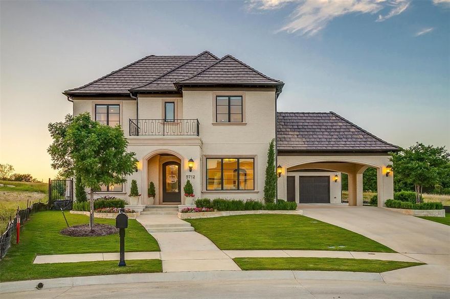 Located in the exclusive gated community of Montrachet this homes offers luxury living with a blend of modern elegance and classic charm. Featuring 5 bedrooms, 4.5 baths and open-concept floor plan with high ceilings, abundant natural light, and high-end finishes. This home embodies both style and functionality with features like a private exercise space, 2 dedicated home office areas and a safe room. Additional highlights include a formal dining, game room and walk in storage space providing plenty of flexibility and comfort. You are greeted by a spacious foyer that leads to a gourmet kitchen complete with high-end stainless steel appliances, custom cabinetry and a large island breakfast bar perfect for entertaining. The kitchen also includes a spacious butler’s pantry with ample storage and prep space, as well as bev refrigerator and ice maker. Adjacent, the spacious living area features a cozy fireplace and large windows that fill the home with natural light and provide stunning views of the backyard oasis. The home sits on nearly half acre of meticulously landscaped grounds, complete with resort style pool, oversized hot tub and a covered patio ideal for TX summers. The primary suite is a true retreat with a spa-like bathroom, dual vanities, soaking tub, walk-through shower and his and her walk-in closets. Split from the primary suite there is a an additional guest suite downstairs. Upstairs you will find 3 bedrooms total. Two of the bedrooms have a Jack and Jill bathroom and another with a private suite. Additionally upstairs you will find a game room and walk in storage. The property also includes a two plus garage with room for a golf cart as well as 2 additional covered spaces. Additional neighborhood amenities are walking trails, basketball or pickleball courts and a community pool. Conveniently located near shopping, dining, and top-rated schools, this property combines luxury, security and convenience, making it an ideal place to call home in Ft Worth.