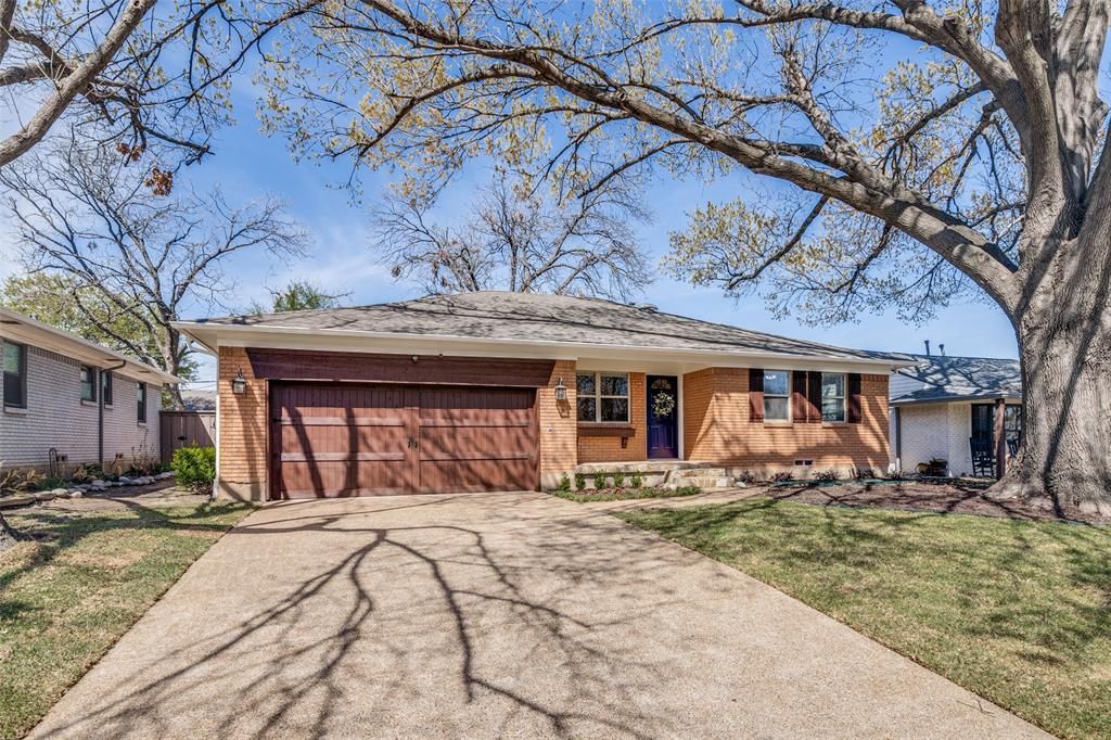 Photo of 10651 Larchfield Lane, Dallas, TX 75238 (MLS # 21209076)