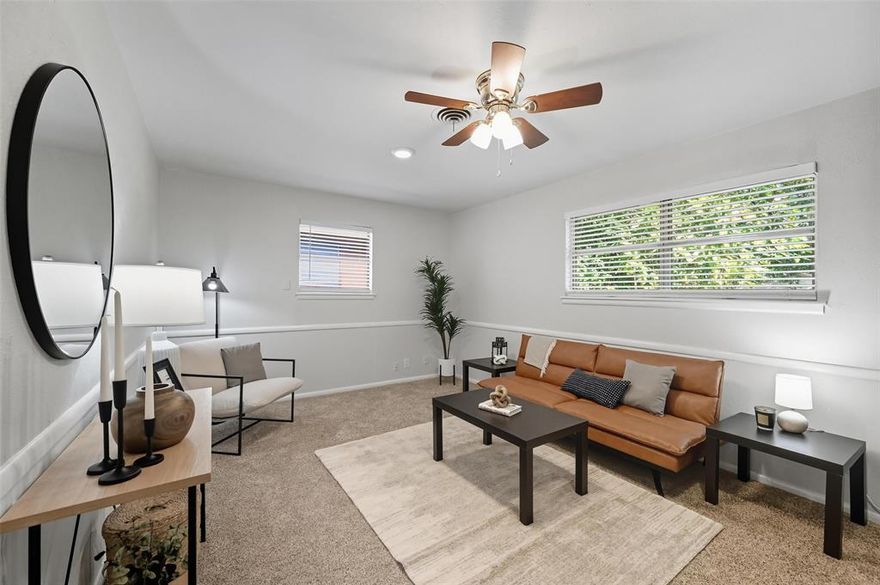 This beautifully refreshed home offers the perfect balance of character and functionality. Step inside to discover an open-concept layout featuring luxury vinyl plank flooring and updated kitchen and bathrooms—creating a bright, inviting space ideal for everyday living and entertaining. A versatile bonus room adds flexibility for a second living area, home office, or creative space to fit your lifestyle needs. Outside, enjoy a spacious covered porch complete with a built-in table for outdoor dining and a cozy swing, perfect for relaxing afternoons. The backyard includes a convenient storage shed—ideal for tools, hobbies, or seasonal items. Located just six minutes from Northeast Mall, this home puts shopping, dining, and entertainment right at your fingertips. With its blend of vintage charm, modern upgrades, and unbeatable location, this home is a fantastic opportunity for comfortable and convenient living. NEW UPDATES FINISHED OCTOBER 2025 include new back patio French doors, blinds throughout home, updated bathrooms and recessed lighting.